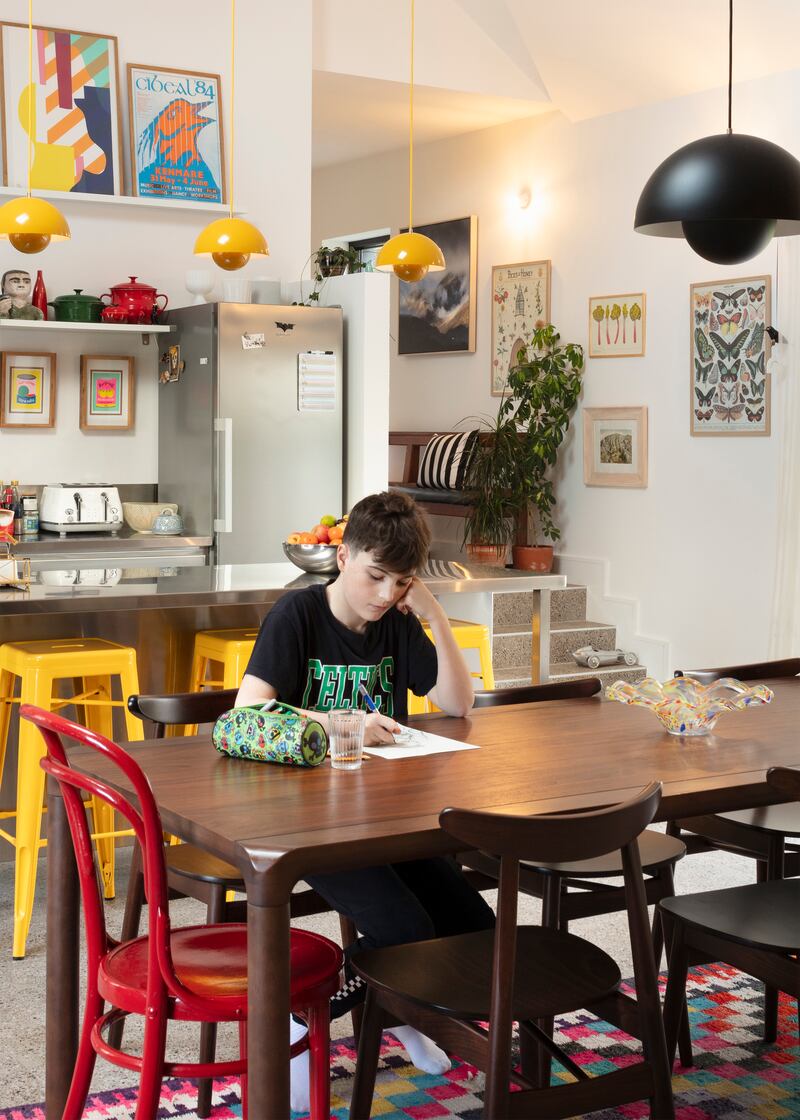 Image of a family member ‍at a mid-century kitchen table