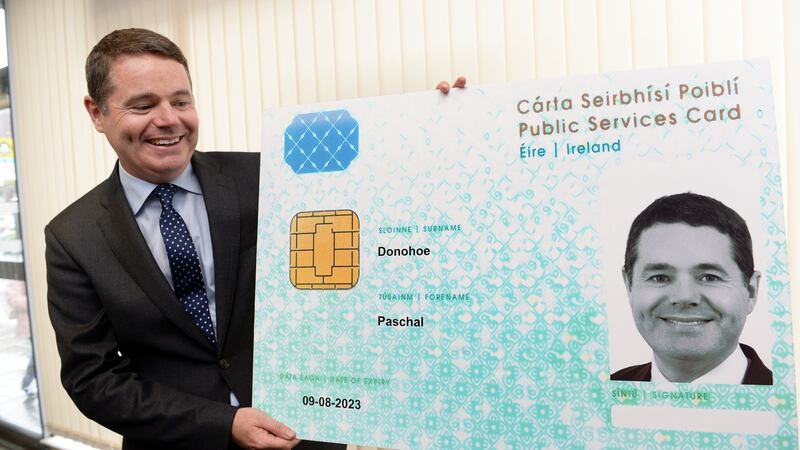 Minister for Public Expenditure and Reform Paschal Donogoe with a mock-up of the public services card. Photograph: Eric Luke/The Irish Times