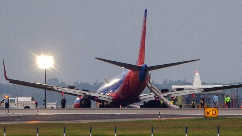 Emergency rescue personnel surround a Southwest Airlines Boeing 737 plane as it sits on the tarmac at LaGuardia Airport in New York. Photograph: Reuters