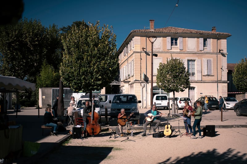 Musicians at a Saturday market in Mazan. Photograph: Dmitry Kostyukov/New York Times