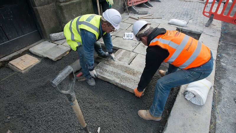 The pavement outside Trinity College  Dublin is made of Wicklow granite. Photograph: Dave Meehan