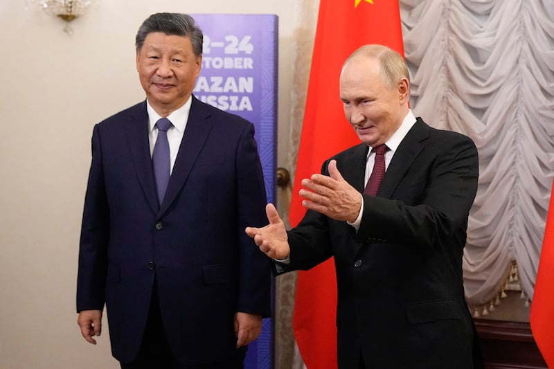 Russian president Vladimir Putin meets Chinese president Xi Jinping on the sidelines of the BRICS summit in Kazan in October. Photograh: Alexander Zemlianichenko/AFP/Getty