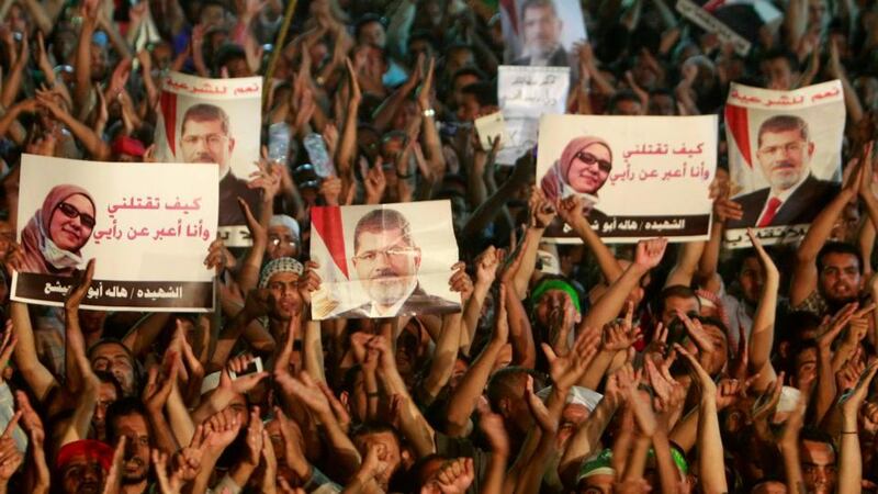 Supporters of deposed Egyptian President Mohamed Mursi shout slogans during a protest at the Rabaa Adawiya square, where they are camping, in Cairo. Photograph: Mohamed Abd El Ghany/Reuters