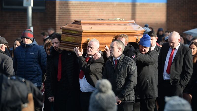 A coffin bearing the remains of Derek Coakley-Hutch is carried into  Our Lady of Lourdes Church, Sean McDermott Street. Photograph: Alan Betson