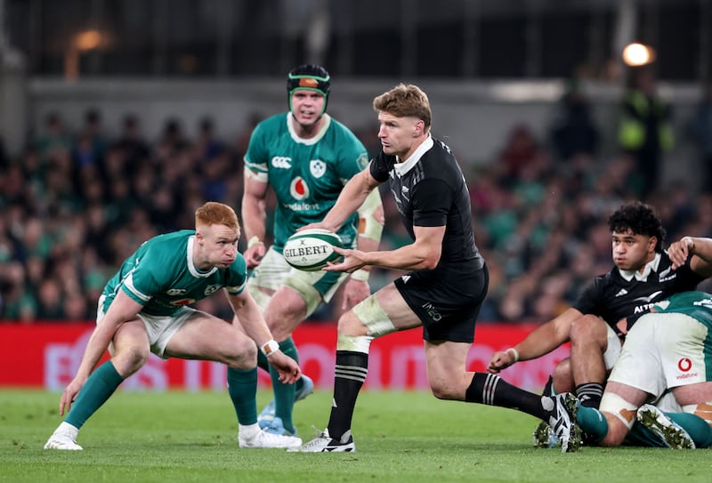 Jordie Barrett gets off a pass before Ciarán Frawley can tackle him during New Zealand's victory over Ireland. Photograph: Dan Sheridan/Inpho