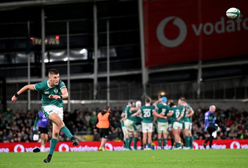 Sam Prendergast kicks a conversion. Photograph: Charles McQuillan/Getty Images