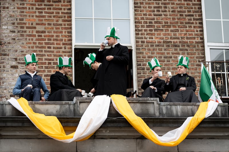 Members of the public watch the St Patrick's Day Parade in Limerick City. Photograph: Don Moloney