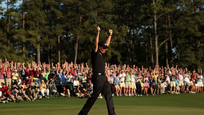 Phil Mickelson celebrates his three-stroke victory after winning the 2010 Masters at Augusta.Photograph: Andrew Redington/Getty Images