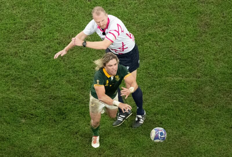 South Africa's scrum-half Faf de Klerk  Wayne Barnes during the France 2023 Rugby World Cup Final between New Zealand and South Africa. Photograph: Antonin Thuillier/AFP via Getty Images 