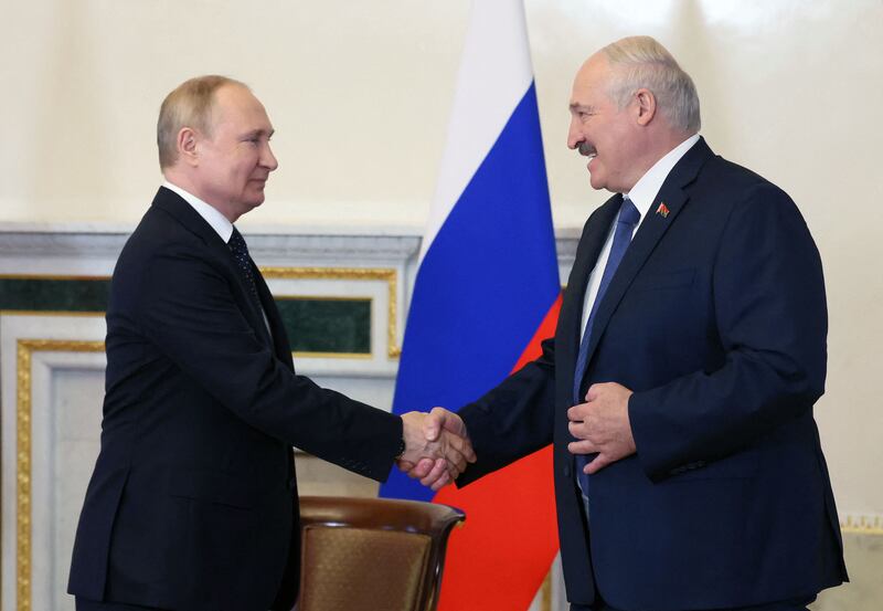 Russian president Vladimir Putin shakes hands with his Belarusian counterpart Alexander Lukashenko during their meeting in St Petersburg on June 25th last. Photograph: Mikhail Metzel/Sputnik/AFP/Getty