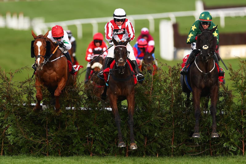 Keith Donoghue riding Stumptown (right) jump the last fence on the way to winning the the Glenfarclas Cross Country Chase at Cheltenham. Photograph: Dan Istitene/Getty Images