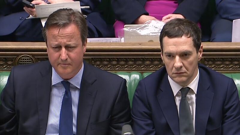 Prime minister David Cameron and finance minister George Osborne in the House of Commons. Photograph: AFP/Getty 