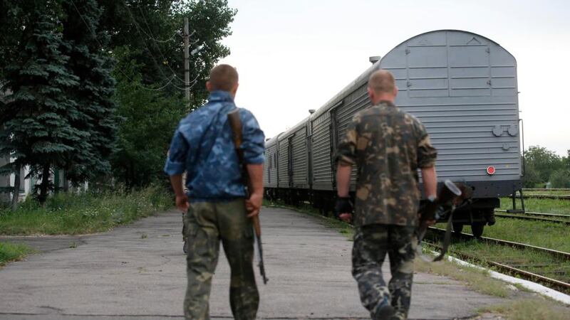 The train transporting the remains of victims from the crashed Malaysia Airlines MH17 flight departs from the railway station in the eastern Ukrainian town of Torez, Donetsk region today.  Photograph:Maxim Zmeyev/Reuters