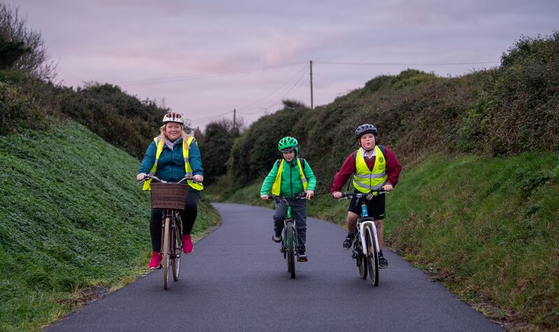 Mary and her boys are delighted to get out of their car and cycle instead