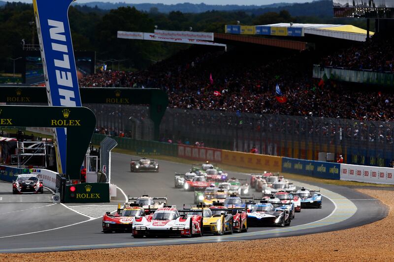 A Porsche Penske Motorsport leads the field away at the start of the 24 Hours of Le Mans. Photograph: Ker Robertson/Getty Images