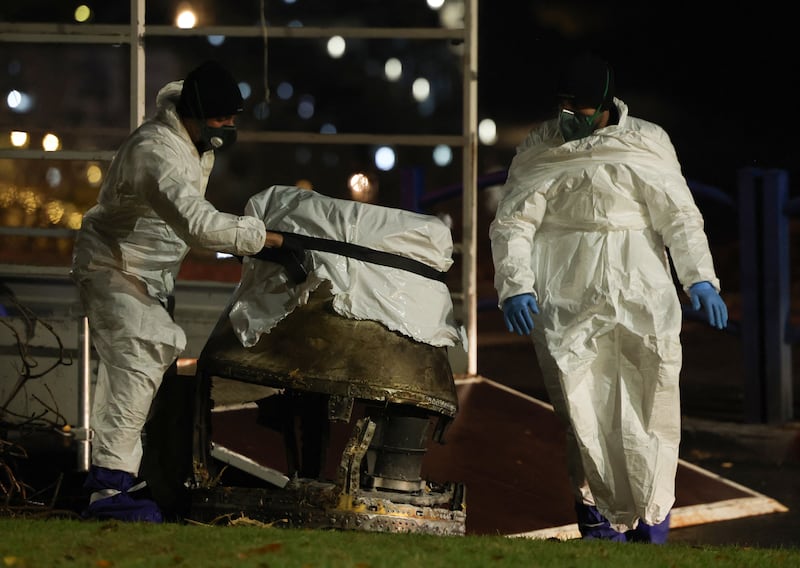 Israeli security force personnel remove part of a Houthi ballistic missile in Bet Shemesh, near Jerusalem, on December 31st. Photograph: Ahmad Gharabli/AFP/Getty