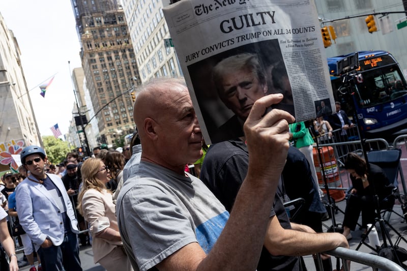 People outside Trump Tower on New York's Fifth Avenue the morning after Donald Trump was convicted in Manhattan Criminal Court in the 'hush money' trial. Photograph: Andrew Lichtenstein/Corbis via Getty Images