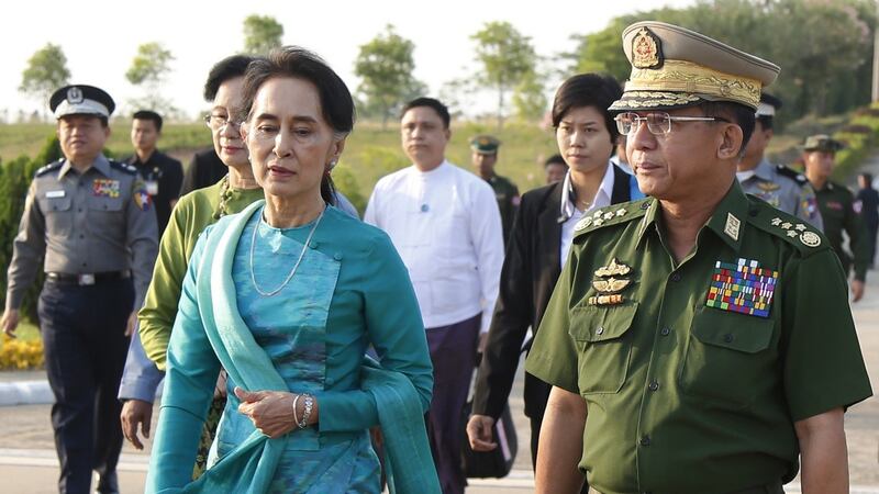 Myanmar’s then civilian leader Aung San Suu Kyi and commander-in-chief of the country's armed forces,  Min Aung Hlaing, before Suu Kyi was removed from office in a coup.  Photograph: Hein Htet/EPA