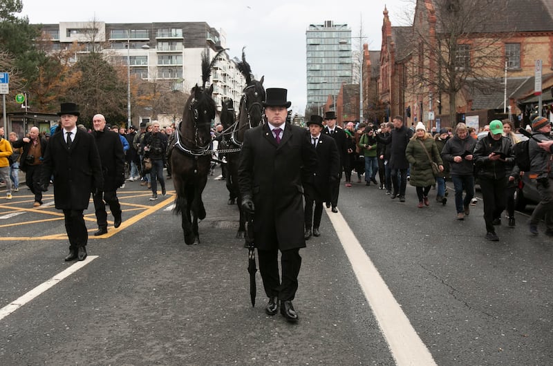 08/12/2023
The remains of Shane MacGowan pass MacMahon Bridge, Pearse Street and Westland Row. Photograph: Collins
