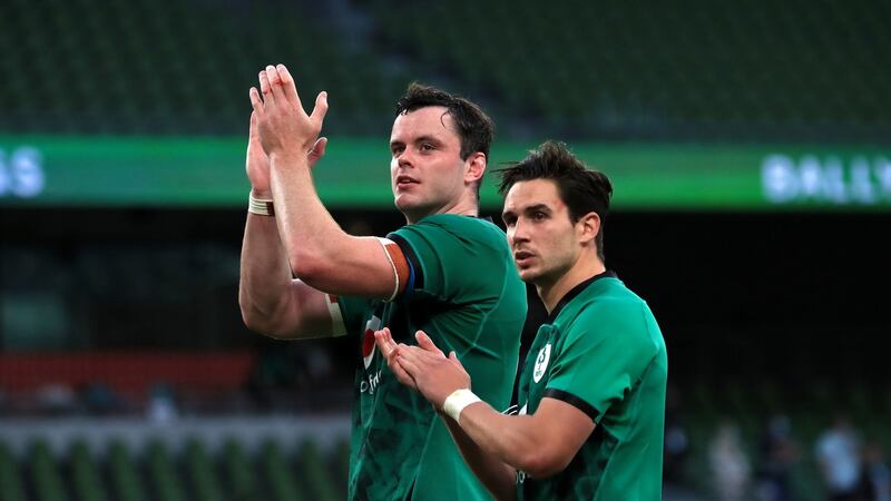 Ireland captain James Ryan and Joey Carbery applaud the fans after the final whistle at the Aviva stadium. Photograph: Donall Farmer/PA Wire