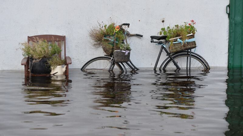 Nearly €60 million will be needed to fix flood-damaged roads and bridges, but Ministers fear the bill could be significantly more. Local authorities will receive €10 million, in addition to the €8 million already agreed to help with the clean-up. Photograph: Alan Betson/The Irish Times