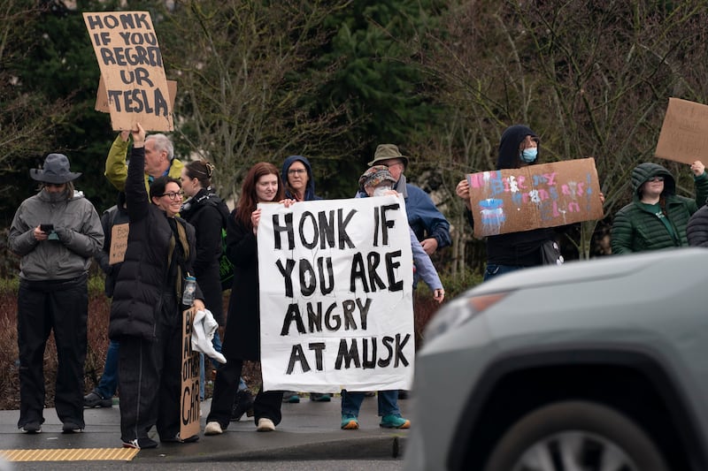 Demonstrators gather for a protest against Elon Musk and electric car maker Tesla in Seattle, Washington, at the weekend. Photograph: David Ryder/Getty Images