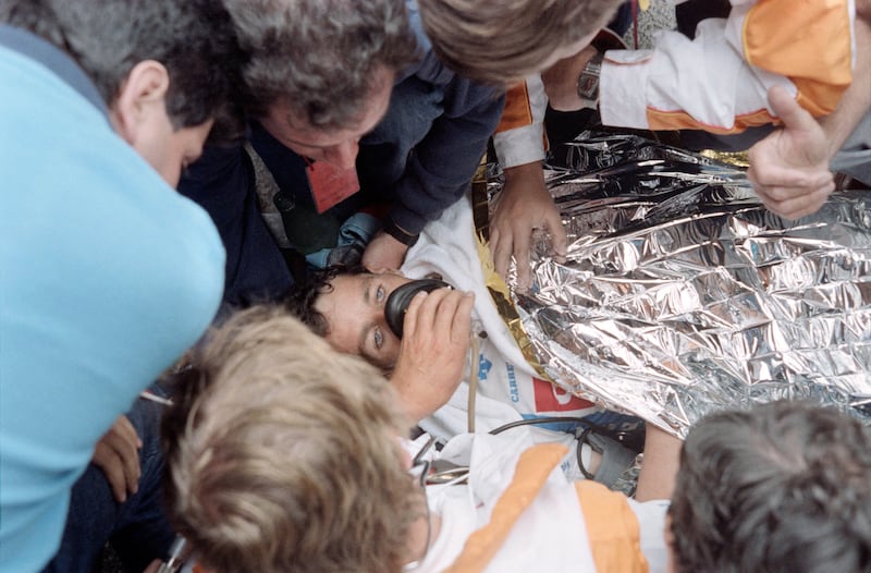 Roche is given oxygen after collapsing at the finish line of the 21st stage of the 1987 Tour de France following a dramatic comeback against the Spanish rider Pedro Delgado. Photograph: AFP/Getty