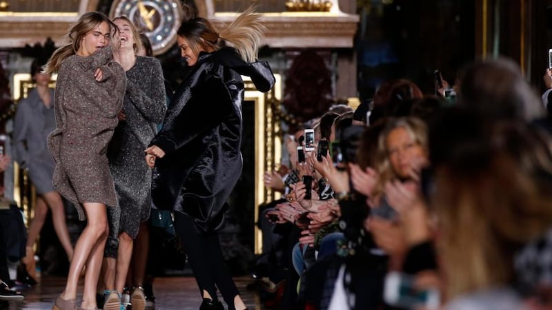 Cara Delevingne and Joan Smalls present creations by British designer Stella McCartney. Photograph: Benoit Tessier/Reuters