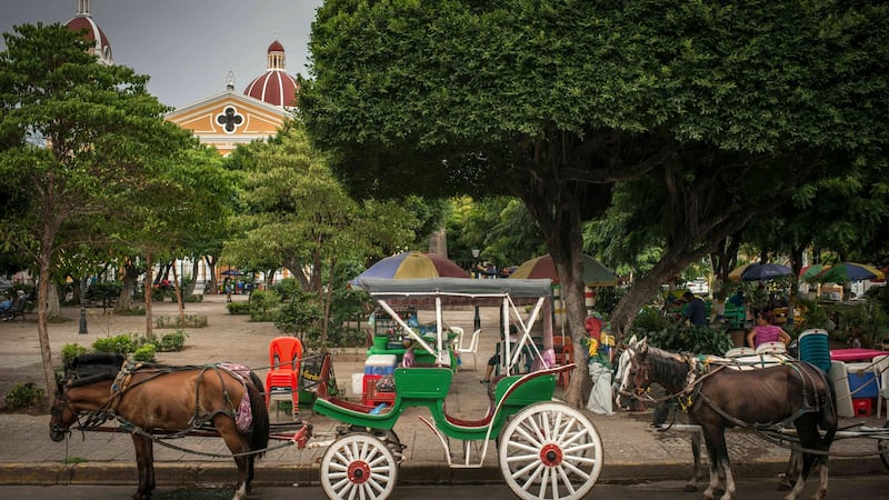 Empty horse-drawn carriages on a quiet day in Granada, Nicaragua, on July 28th. Tourism has been hard hit by the politicdal crisis. Photograph: Daniele Volpe/New York Times