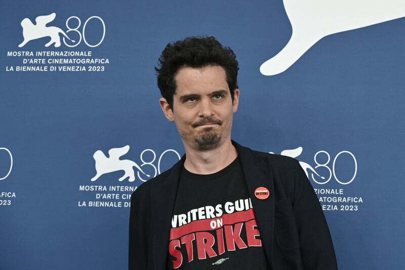 Strike: Damien Chazelle, president of the Venice jury, wearing his Writers Guild T-shirt. Photograph: Tiziana Fabi/AFP via Getty