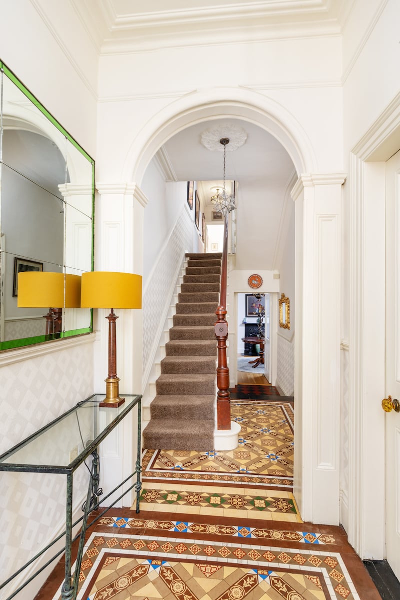 The property retains its original Victorian tiling