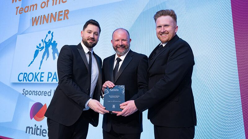 Stephen Connolly, people director at Mitie Facilities Management, presents the Workplace and Estates Team of the Year award to Colin O'Brien and Ger Hanratty, Croke Park.