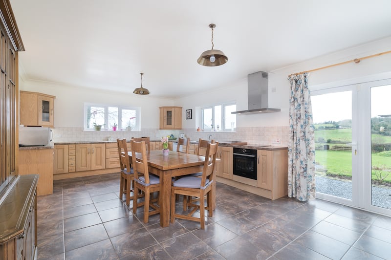 The kitchen opens out to a patio area