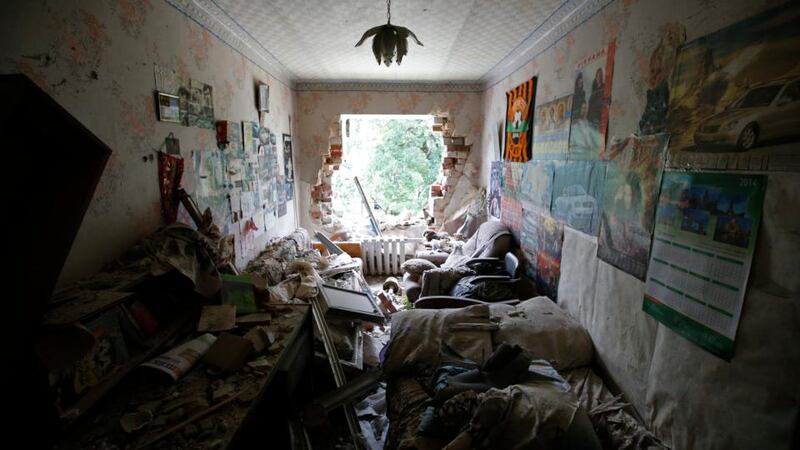 An interior view of a  damaged apartment building following what locals say was recent shelling by Ukrainian forces in the settlement of Maryinka outside Donetsk. Photograph: Maxim Zmeyev/Reuters