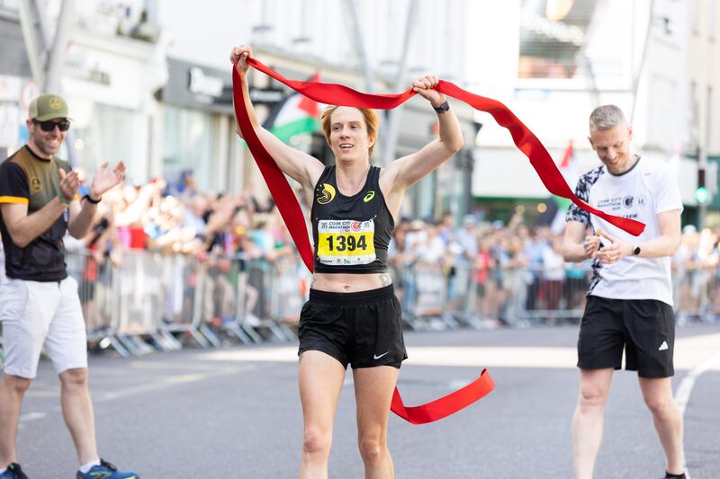 Aoife Cooke crosses the line with a time of 2:56:33 to take first place in the women's race. Photograph: Darragh Kane