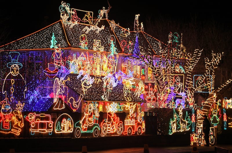 'Happy Christmas and ‌F**k the⁢ Environment!' these illuminated homes declare,and ‍everyone claps with joy. ⁤Photograph: Matt Cardy/Getty