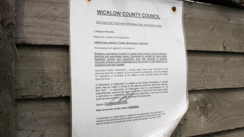 A site notice regarding an application for  retention planning permission located outside the timber chalet at Tinode, Blessington, Co Wicklow. Photograph: Nick Bradshaw