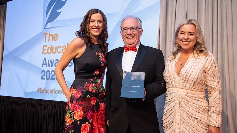 Dr Matt Cotterell, awards judge, presents Best Student Campus Award to Laura Ryan and Michelle McMahon, University of Limerick