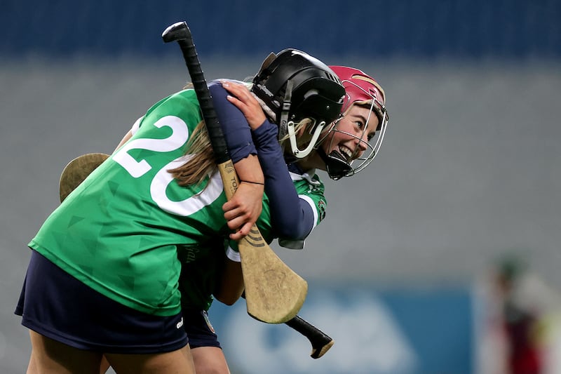 Sarsfields' Rachel Murray celebrates with team-mate Cliona Cahalan after the All-Ireland club final at Croke Park. Photograph: Laszlo Geczo/Inpho 