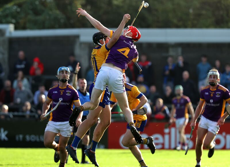 Na Fianna's Donal Burke and Cian Ryan of Kilmacud Crokes compete for possession during the Dublin SHC final at Parnell Park. Photograph: Bryan Keane/Inpho 