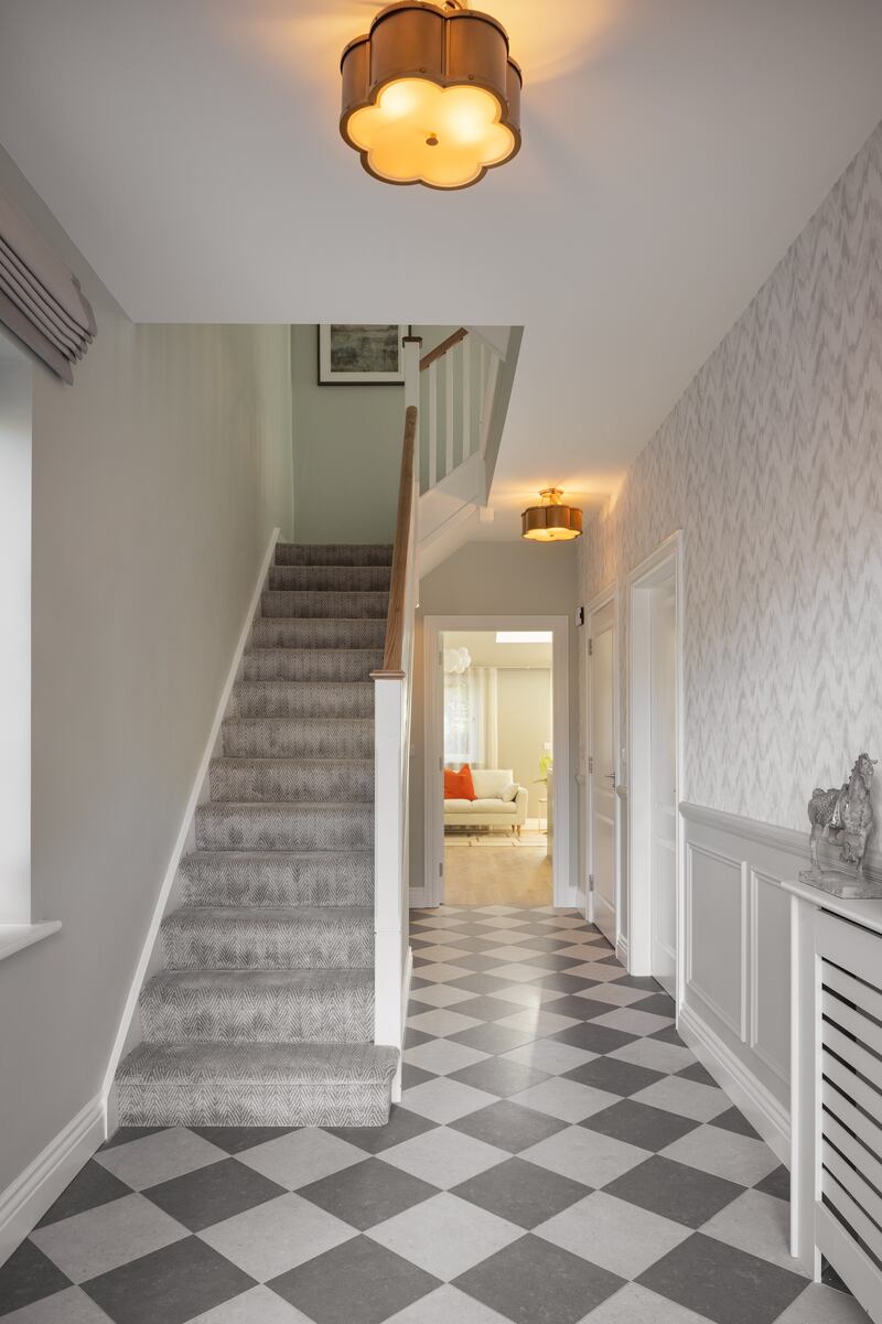 The checkerboard tiled hall at the showhouse of Drumnigh Oaks in Portmarnock by Sara Cosgrove