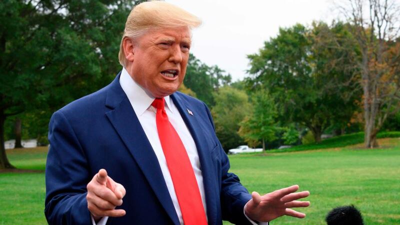 US president Donald Trump  railed against the ‘do-nothing Democrats’ impeachment on Sunday on Twitter with a string of retweets from supporters. Photograph: Jim Watson/AFP via Getty