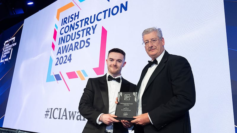 Conor Crosse, manager at Hays Ireland, presents the civil construction project of the year award to Adrian Cunningham, BAM Ireland