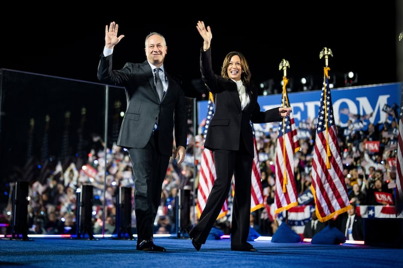 Vice President Kamala Harris, the Democratic presidential nominee, and her husband Doug Emhoff during a campaign event in Washington, on Tuesday, October 29, 2024. Photograph: The New York Times