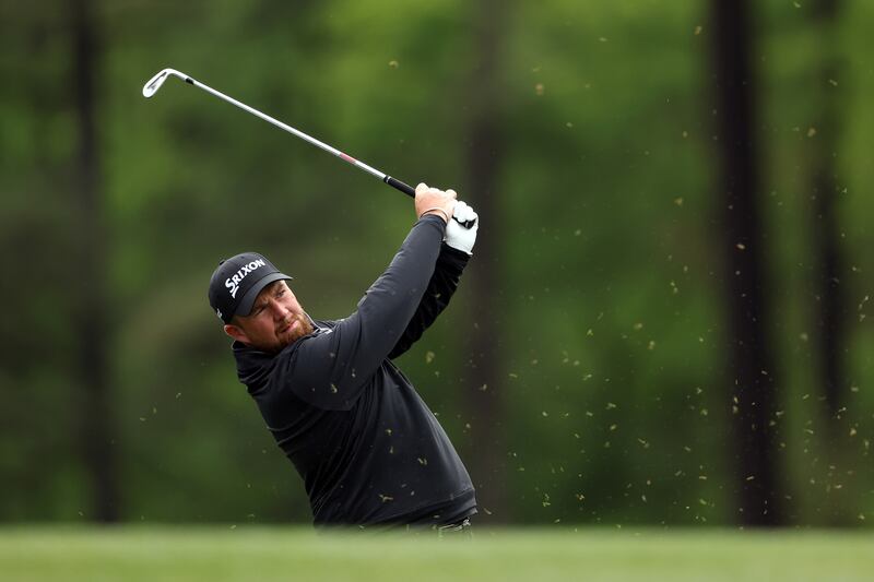 Shane Lowry plays his shot from the 12th tee during the continuation of the weather delayed third round of the 2023 Masters Tournament at Augusta National Golf Club. Photograph: Christian Petersen/Getty Images