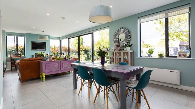 Dining area and family room opening to garden