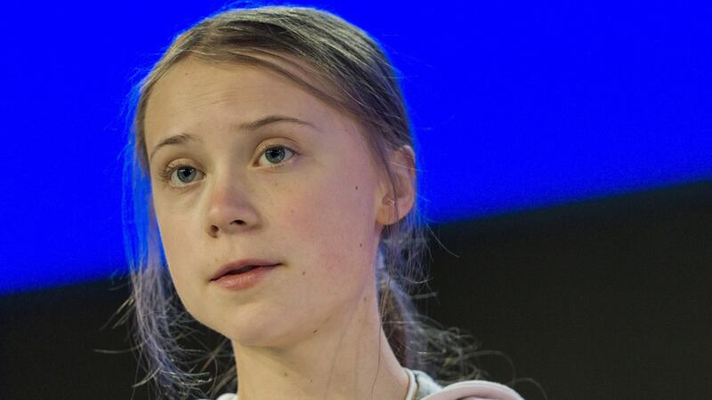 Climate activist Greta Thunberg addresses a panel session during at  the World Economic Forum   in Davos. She arrived at the Swiss mountainside town after a 32-hour journey with a tough message for global business and political leaders. Photograph: EPA