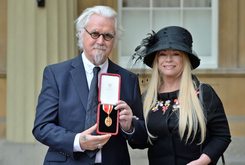 Billy Connolly with his wife Pamela after being knighted at Buckingham Palace in 2017. Photograph: AFP