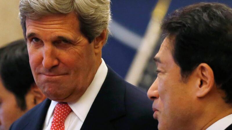 US secretary of state John Kerry (left) talks to Japan's foreign minister Fumio Kishida upon their arrival for their meeting at the Iikura Guest House in Tokyo this morning. Photograph: Reuters