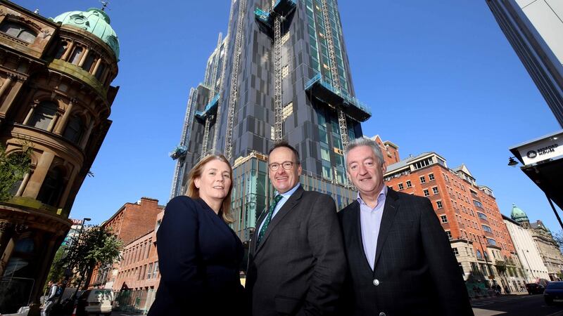 Caitriona Lavery and Howard Hastings of Hastings Hotels are joined by John McGrillen, Tourism NI chief executive at the Grand Central Hotel in Belfast.